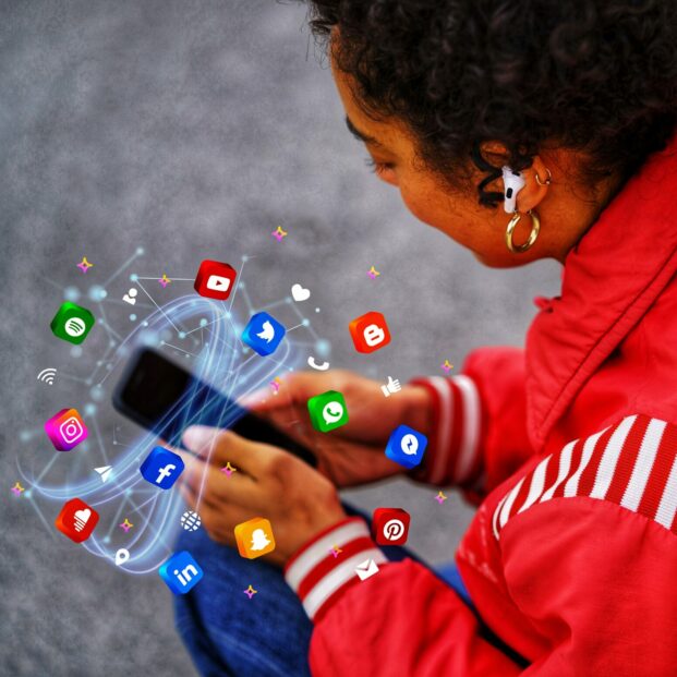 high-angle-woman-holding-smartphone-01